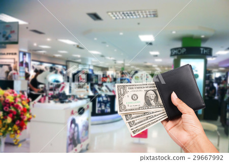 Hand women hold money in black wallet Hand women hold money in black wallet 29667992