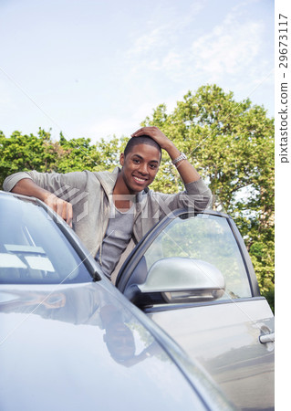 Teenagers with car 29673117