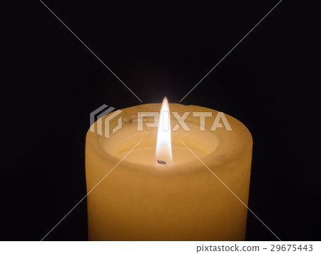 Burning, wax candle on a dark background with Burning, wax candle on a dark background with 29675443