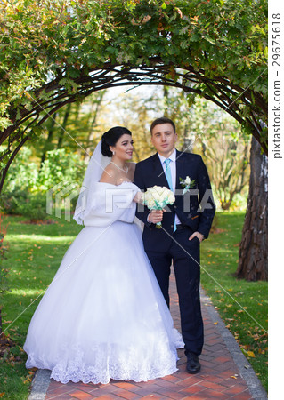 The bride has tenderly embraced the groom The bride has tenderly embraced the groom 29675618