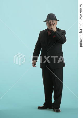 Men in suits sucking cigars 29676679