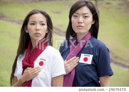 A young woman supporting the women's soccer Japan national team 29676870