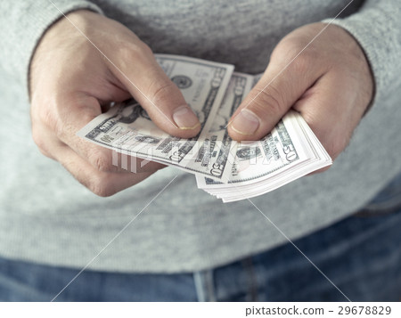 Hands counting dollars Hands counting dollars 29678829