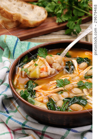 Chicken soup with beans Chicken soup with beans 29679468
