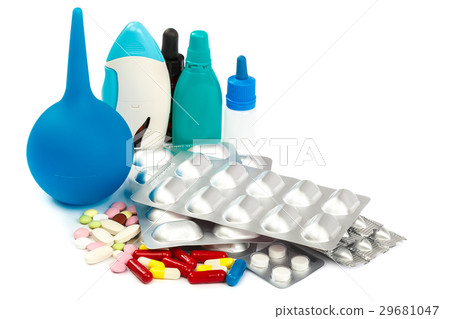 Pills in blister packs on white background. 29681047