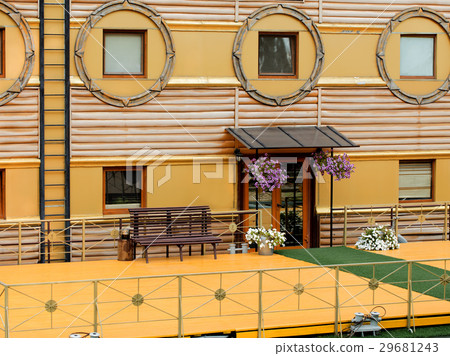 Fragment the facade of old house in orange style 29681243