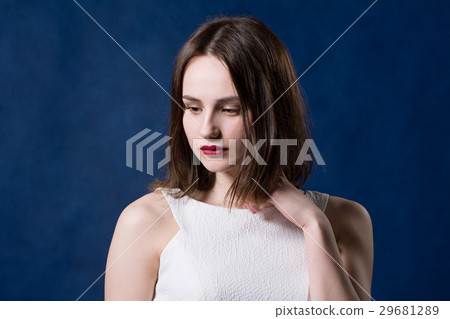 Portrait of a cute beautiful brunette looking Portrait of a cute beautiful brunette looking 29681289