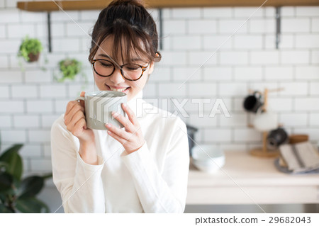 A woman with a Scandinavian girls kitchen mug A woman with a Scandinavian girls kitchen mug 29682043