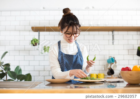 Northern Europe girls kitchen woman cooking Northern Europe girls kitchen woman cooking 29682057