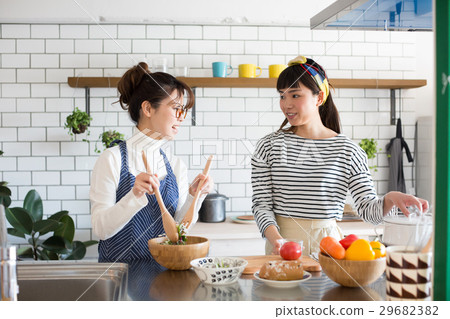 Scandinavian girls kitchen food women friends 29682382