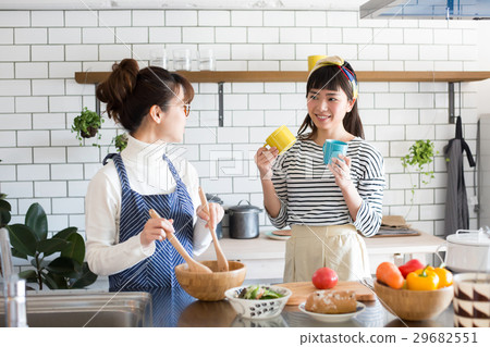 Scandinavian girls kitchen food women friends 29682551