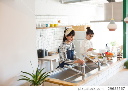 Scandinavian girls kitchen food women friends 29682567