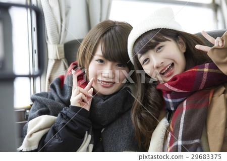 Winter girls travel snow scenic local line 29683375