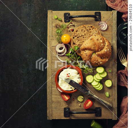 Homemade bread loaf and fresh ingredients Homemade bread loaf and fresh ingredients 29684510
