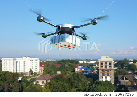 Drone with first aid kit flying over the town. 29687280