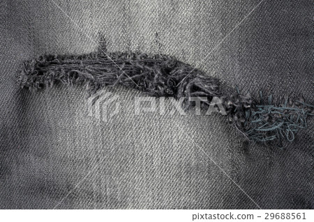 Black jeans torn denim texture. Black jeans torn denim texture. 29688561