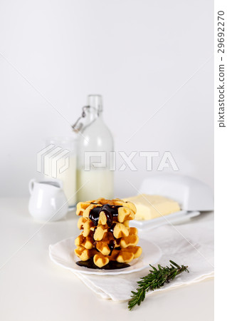 Fresh Belgian waffles with chocolate white wooden Fresh Belgian waffles with chocolate white wooden 29692270