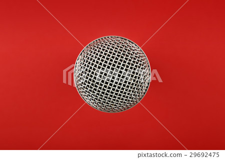 Microphone close up top view over red 29692475