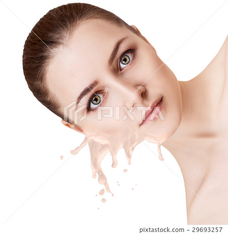 Foundation splashes on beautiful woman's face. 29693257