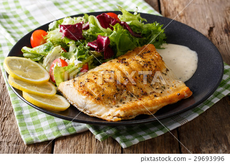 Grilled char fillet with mixed salad and sauce Grilled char fillet with mixed salad and sauce 29693996