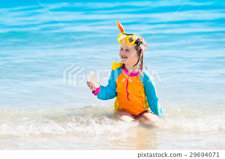 Child snorkeling on tropical beach Child snorkeling on tropical beach 29694071