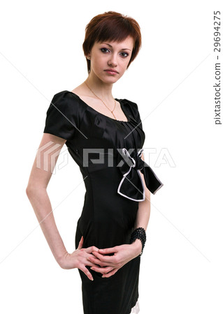 Sexy young woman in a little dress, isolated on 29694275