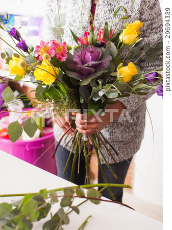 Florist making a bouquet  29694389