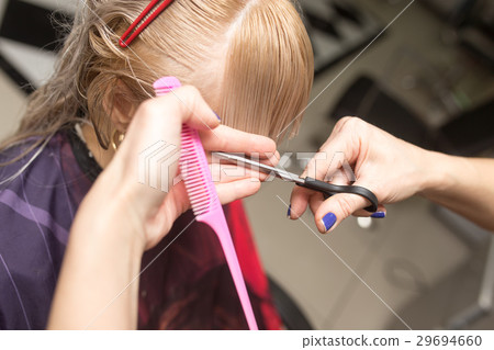 Female haircut with scissors Female haircut with scissors 29694660