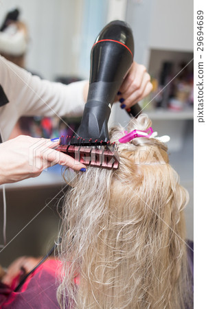 Styling female hair dryer 29694689