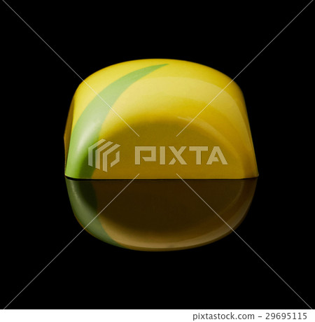 chocolate candy on black background 29695115