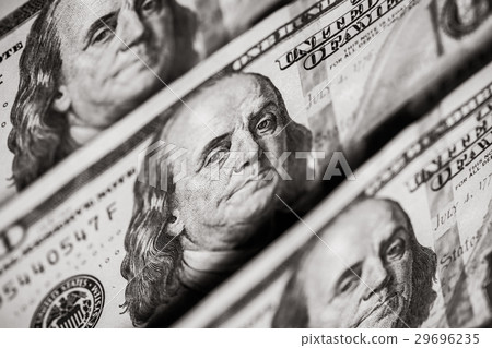 Hundred dollars bills standing in a row 29696235