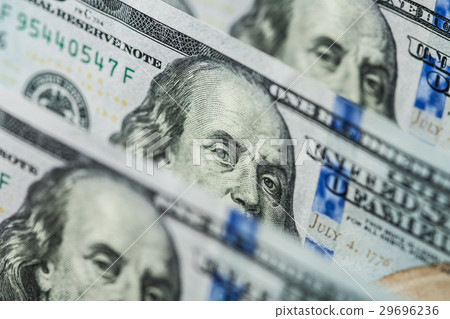 Hundred dollars bills standing in a row 29696236