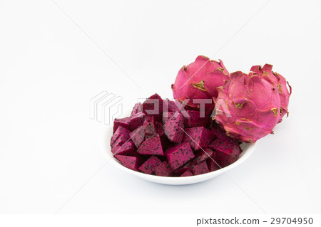 Red Dragon fruit in a plate. Red Dragon fruit in a plate. 29704950