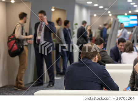 Business people conduct conversations 29705204