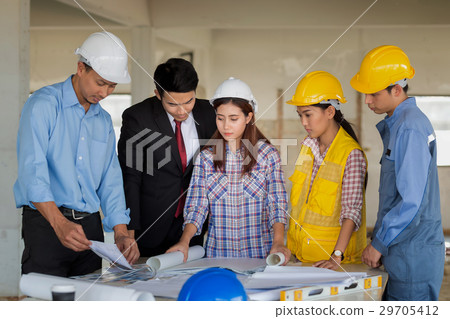 Asian foreman worker checking construction site Asian foreman worker checking construction site 29705412