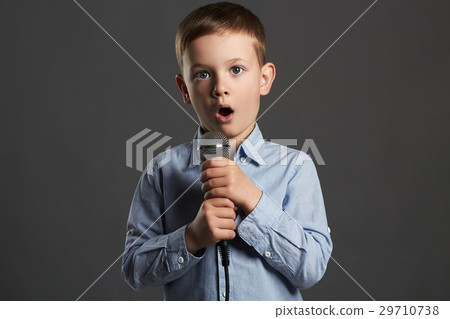 little boy with microphone.child singing karaoke little boy with microphone.child singing karaoke 29710738