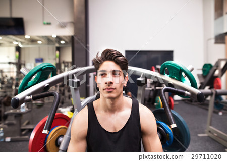 Hispanic man in gym prepared for training on 29711020