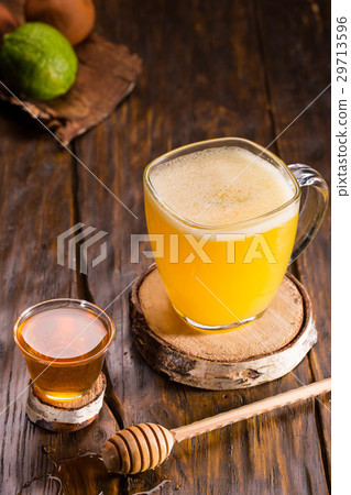 Brandy with orange juice, amaretto with a lime and 29713596