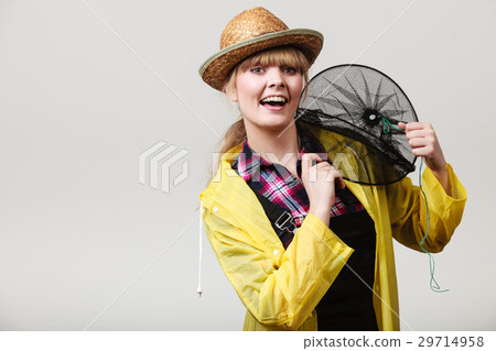 Happy woman holding empty fishing keepnet 29714958