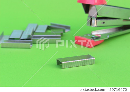 staples on isolated green 29716470