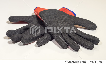 Pair of cotton work gloves isolated Pair of cotton work gloves isolated 29716786