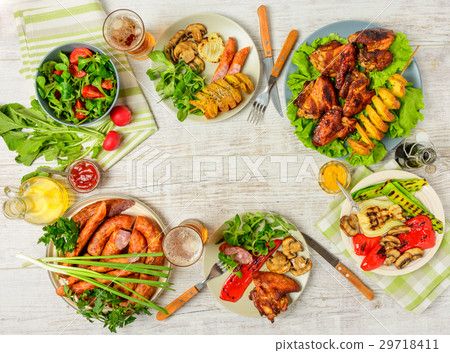 Dinner table with variety food 29718411