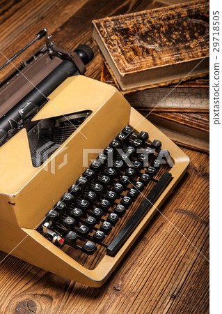 old typewriter, a pile of books old typewriter, a pile of books 29718505