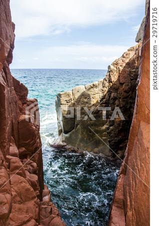 Arbatax red porphyry rocks nearby port Capo 29719716