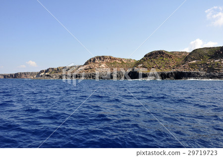 Blue sea and characteristic caves of Cala Luna Blue sea and characteristic caves of Cala Luna 29719723