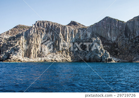 Blue sea and characteristic caves of Cala Luna 29719726