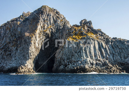 Blue sea and characteristic caves of Cala Luna Blue sea and characteristic caves of Cala Luna 29719730