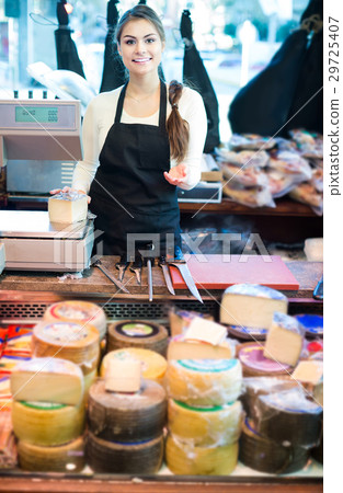 brunette with different types of cheese in gastronomy 29725407
