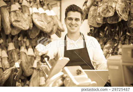 Seller in delicatessen section Seller in delicatessen section 29725487
