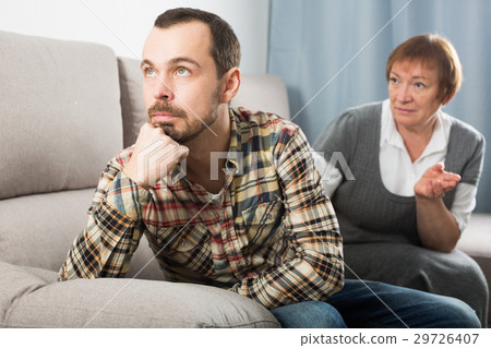 Elderly mother and son quarrel Elderly mother and son quarrel 29726407